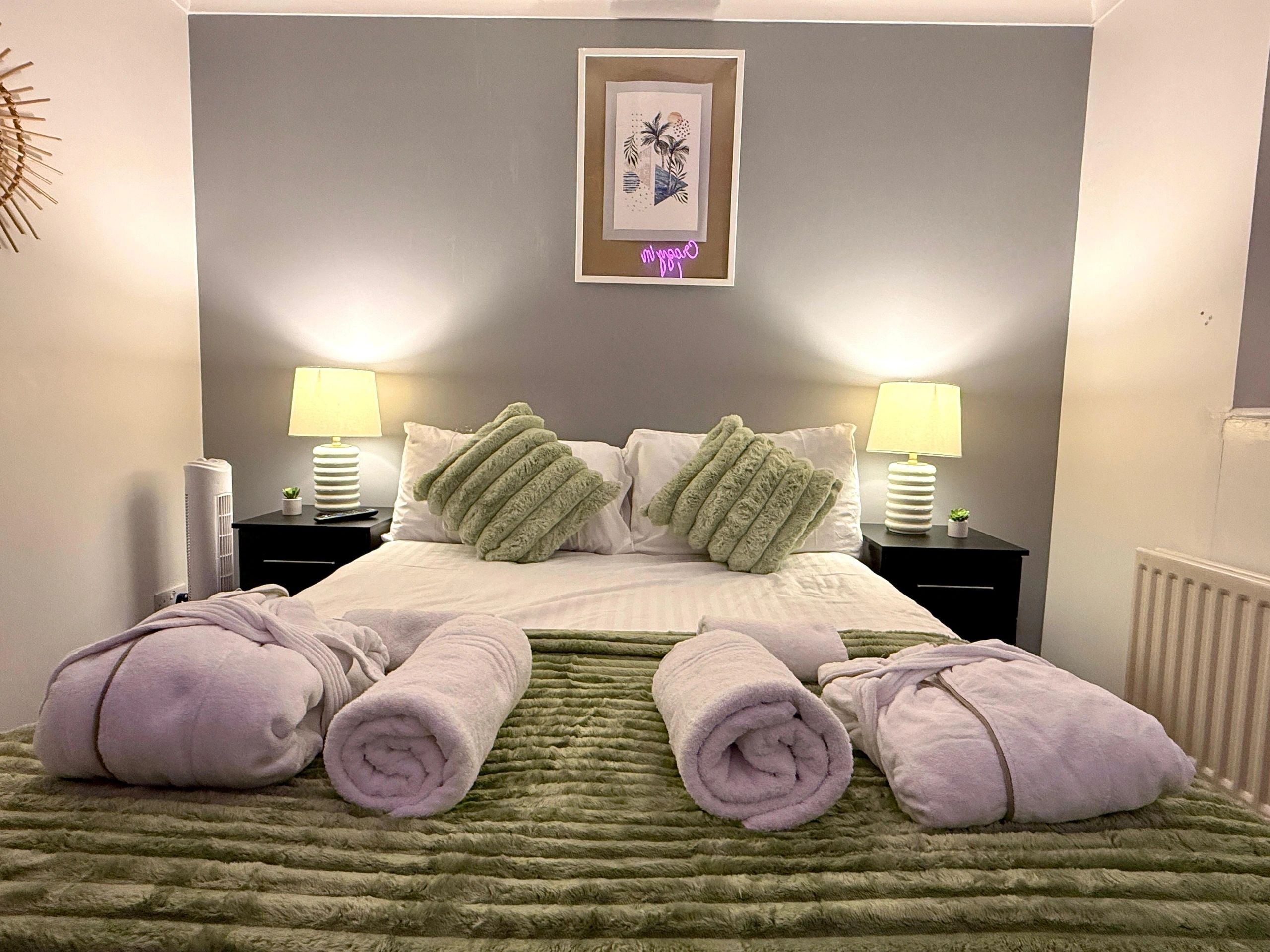 SCC Homes East Sussex bedroom with green bedding